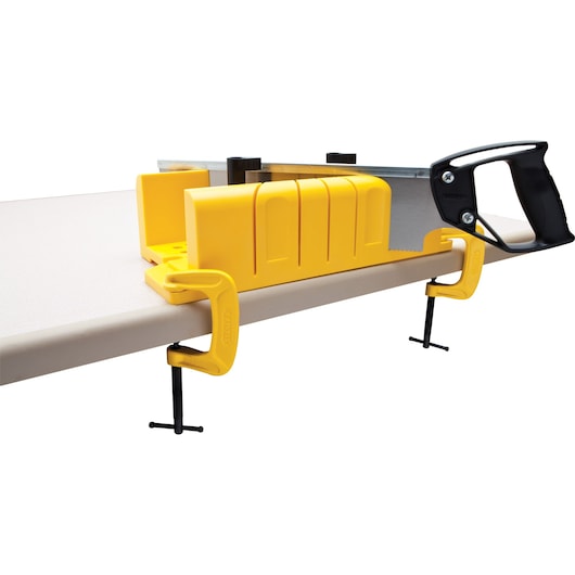 STANLEY 20-600 yellow miter box with clamps and hand saw, side angle on white background.