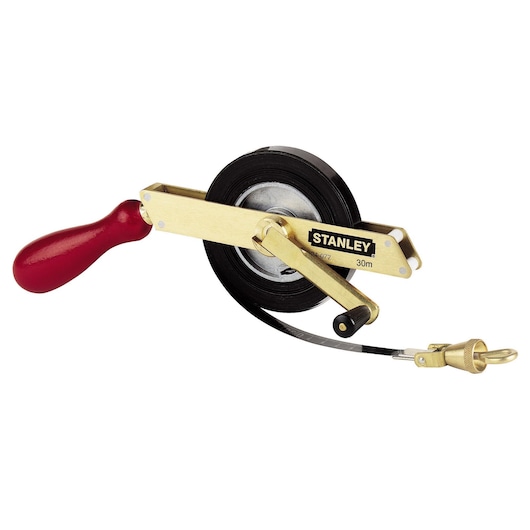 STANLEY 34-077 open reel measuring tape with metal frame, red handle, and 30m length, product photo on white background.