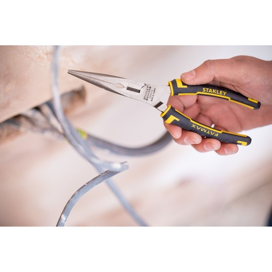 Stanley 89-870 FATMAX long nose pliers with black and yellow handle held near electrical wires.