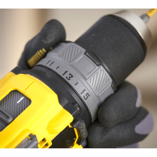 STANLEY SFMCD725D2K cordless drill close-up showing torque settings and yellow casing.