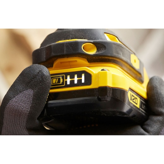Photo of STANLEY SFMCF800DM2 power tool grip showing V20 battery indicator close-up.