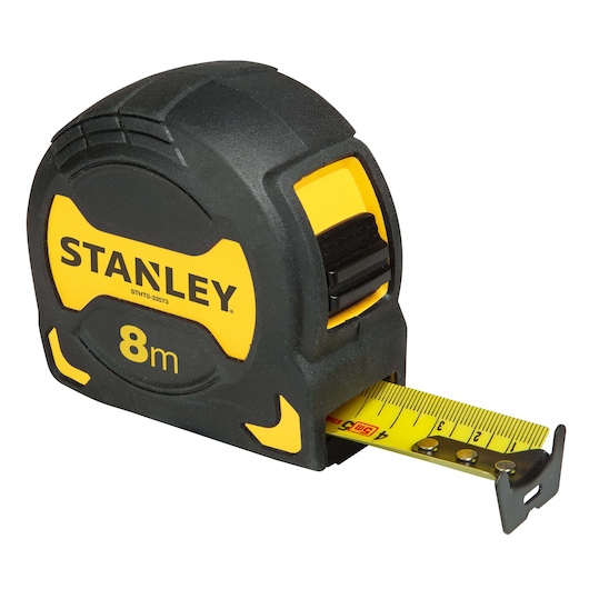 Stanley 8m yellow and black tape measure with metric markings and retractable metal tape.